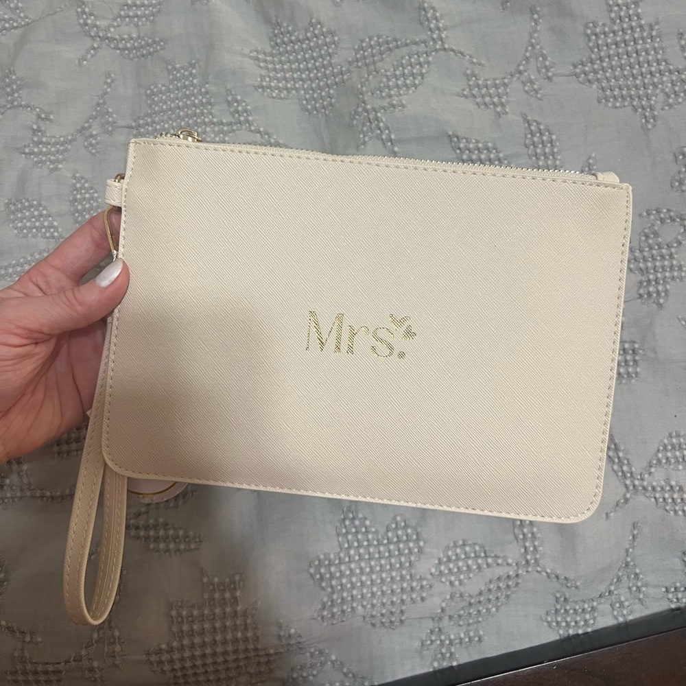 Elegant Cream Clutch with Gold Accents